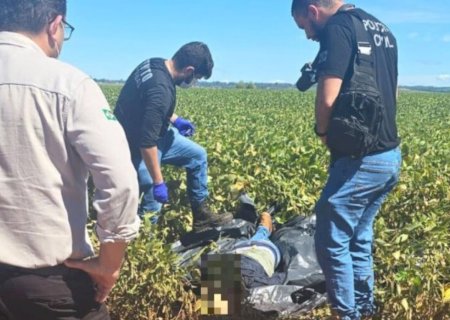 Suspeita na morte de homem que teve corpo desovado em plantação é presa; polícia procura outros três